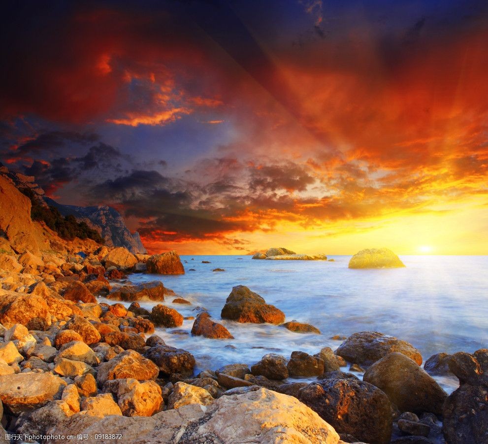 霞光满天下的海水岩石图片图片-图行天下图库